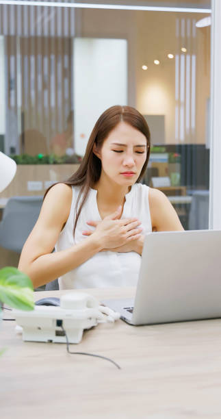 istock businesswoman have heart attack 1585167723