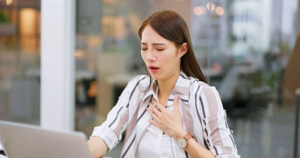 istock woman is sick at work 1585173195