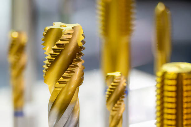Close up of the special machine tapping tool. The thread cutting concept on machining center.
