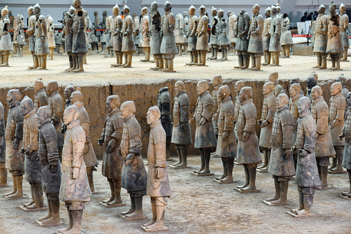 Xi'an, Shaanxi Province, China - October 28, 2015: Awesome view of the Terracotta Warriors of the famous Terracotta Army inside the Qin Shi Huang Mausoleum of the First Emperor of China.