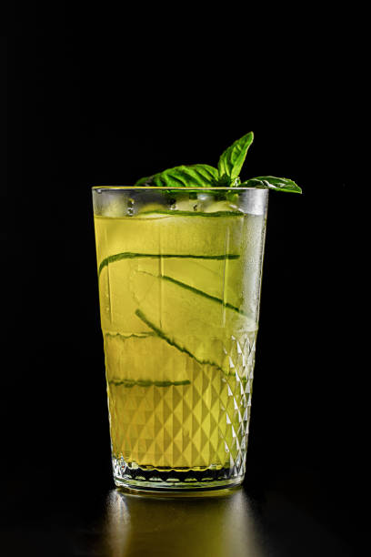 istock lemonade with ice cubes on black background 1585225184