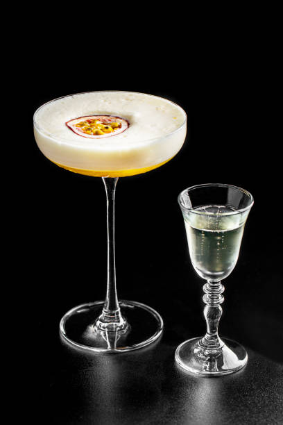 alcoholic cocktail with liquor on black background stock photo