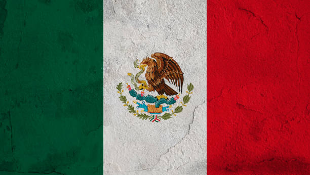 istock Flag of Mexico on a rustic wall 1585271531
