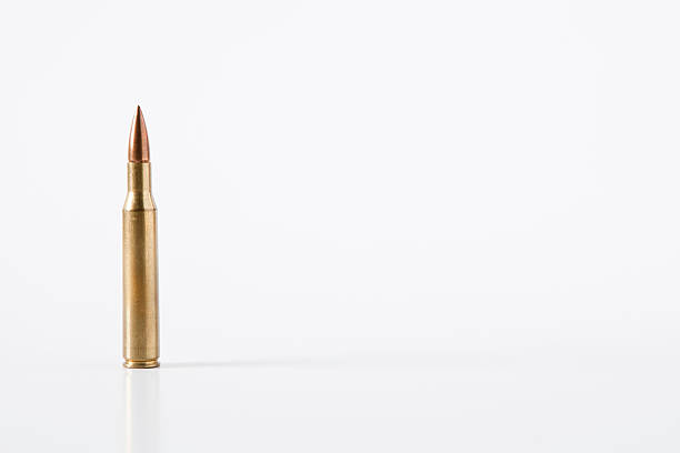 7.62 mm Caliber Bullet Isolated on White Background stock photo