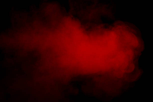 istock Orange and red steam on a black background. 1585328721