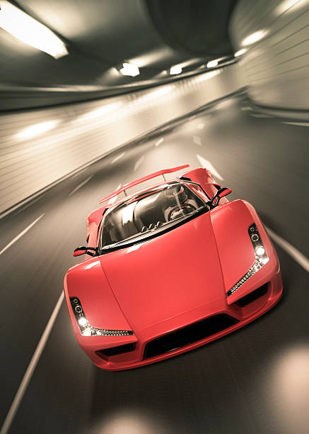 Time-lapse photo of red Lamborghini speeding at tunnel stock photo
