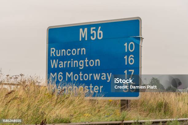 M56 Motorway Sign Stock Photo - Download Image Now - Arrival, Color Image, Distance Marker