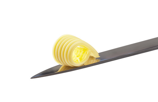 Butter curl on a knife - cutout