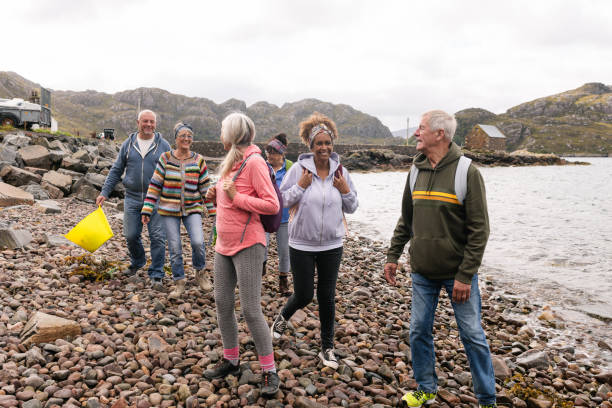 istock Walking Along The Clean Shoreline 1585383619