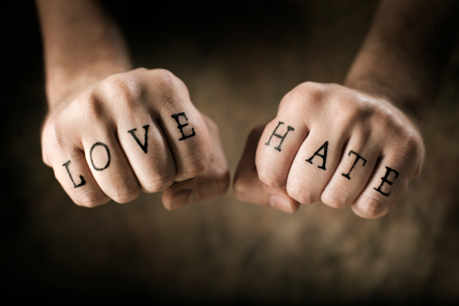 Man with (fake) Love and Hate tattoos on his hands.