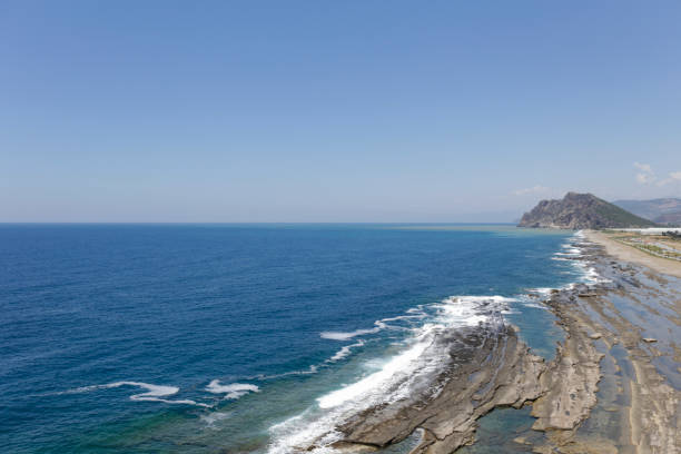 istock Panoramic view of a rocky beach 1585432029