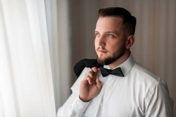 istock portrait of a handsome man with a bow tie 1585446070
