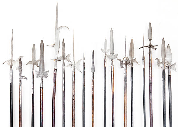 Halberds on a white wall Halberds infront of a white wall. spear stock pictures, royalty-free photos & images
