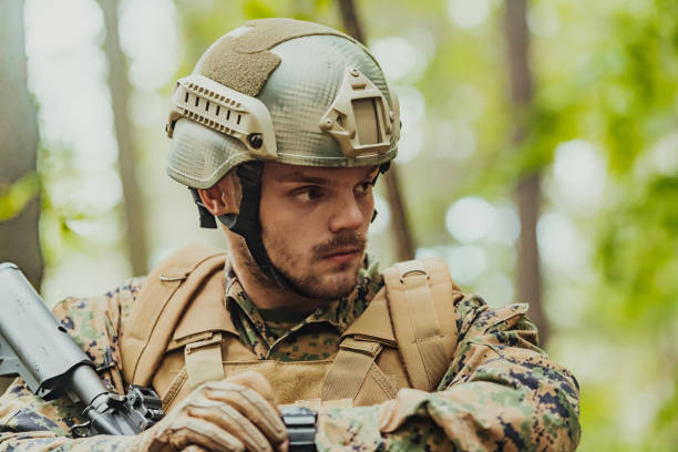 istock American marine corps special operations soldier preparing tactical and commpunication gear for action battle closeup 1585469361