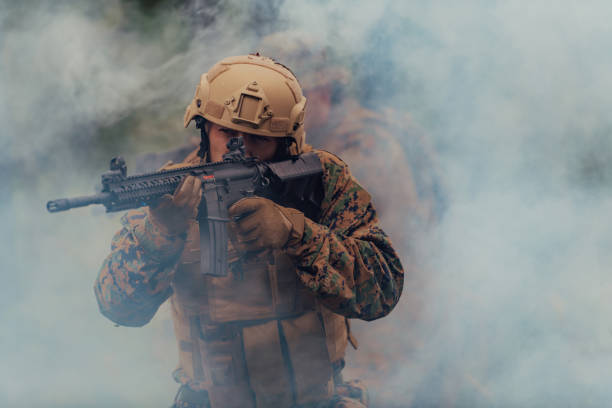 istock A soldier fights in a warforest area surrounded by fire 1585472544