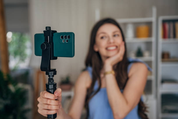 istock Woman vlogging at home 1585473018