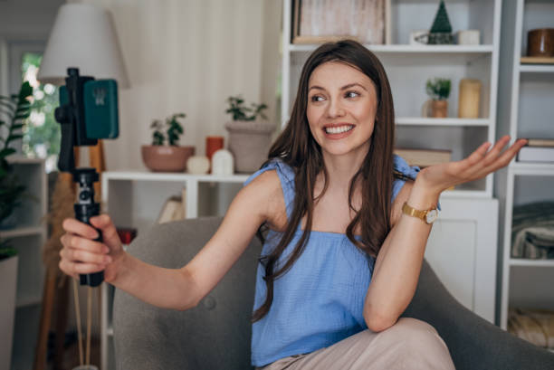 istock Woman vlogging at home 1585473082