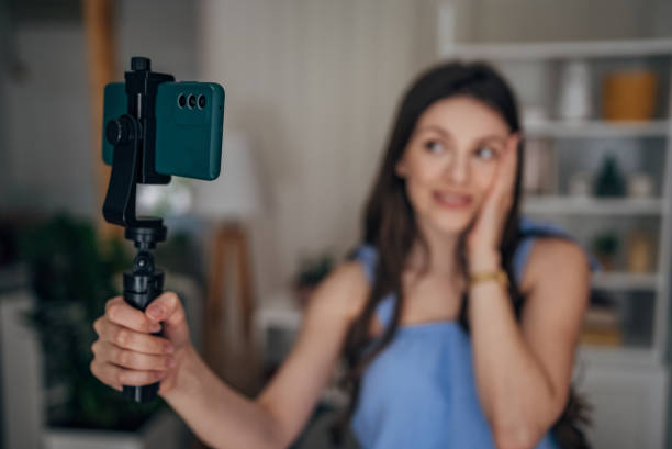 istock Woman vlogging at home 1585473148