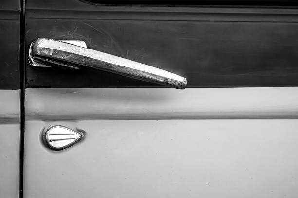 Door handle on old timer car in black and white Door handle from old car in the car show cruising hot rods stock pictures, royalty-free photos & images