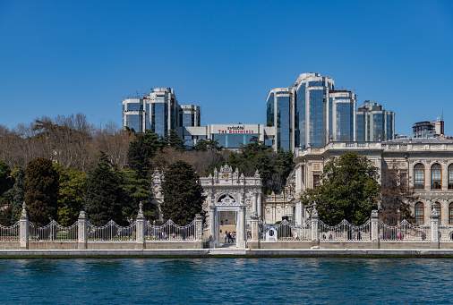 Istanbul, Turkey - April 8, 2023: A picture of the Dolmabahce Palace and the Swissotel - The Bosphorus Istanbul.