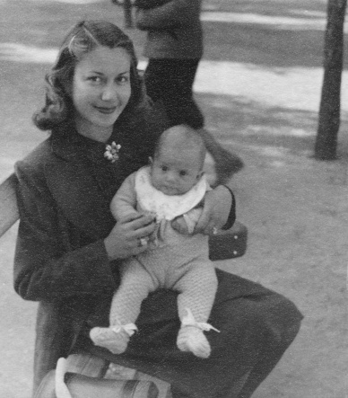 Mother and child on a bench. 1949.