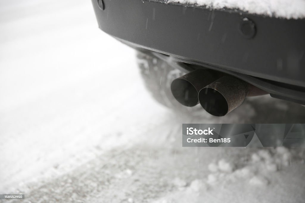 Car Exhaust Pipe Car Exhaust Pipe in Snow Car Stock Photo