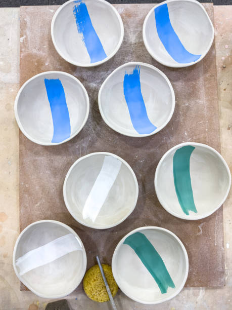 istock A selection of greenware ceramics bowls decorated with underglaze and ready for the first bisque fire 1585532505
