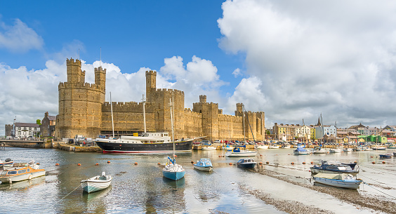 Caernarfon,Wales on 17th July 2023: Caernarfon Castle is situated on the River Seiont overlooking the Menai Straits in North wales