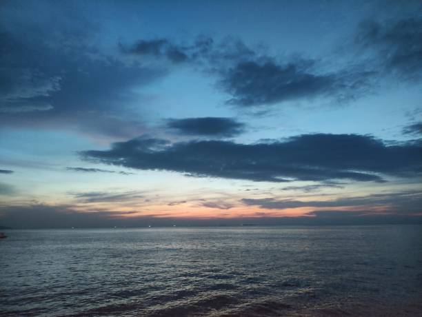 istock Sunset at Bangsaen sea on a clear day 1585569583