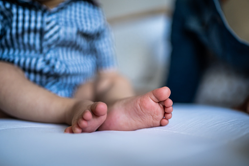 Baby foot on the bed