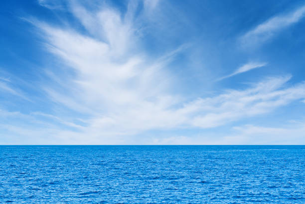 istock Blue sea and white clouds on sky. Water cloud horizon background Feeling calm, cool, relaxing, ocean 1585593390