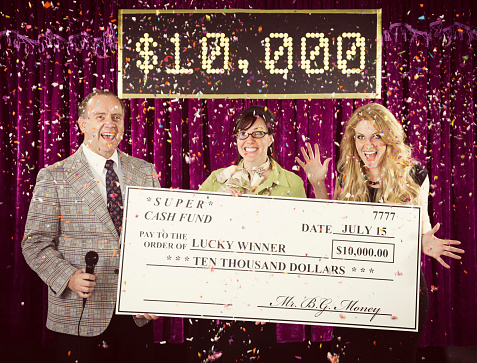 A retro-processed game show host and assistant presenting an over-sized $10,000 check to the winner amidst falling confetti. Photographed in studio with a purpose built set and props.