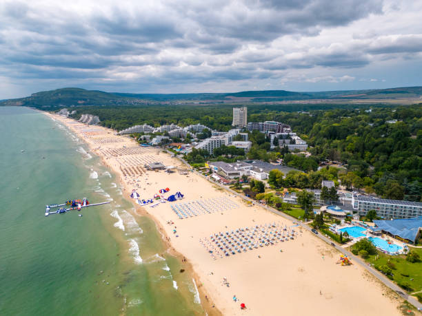 aerial view of Bulgaria's resort during the summer season: an array of hotels, pools, and crowds of people enjoying the sea. stock photo