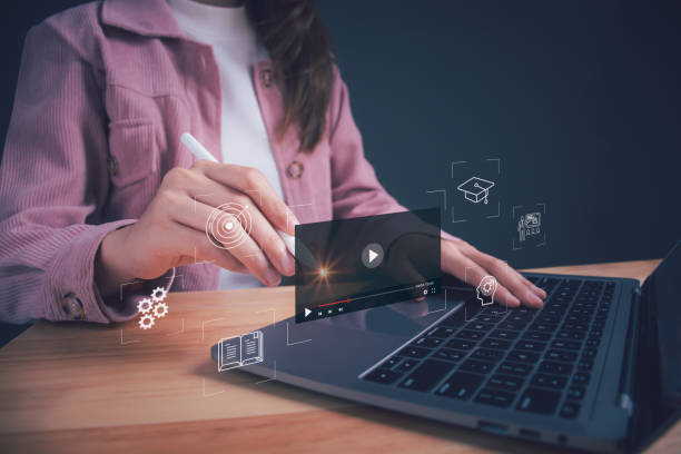 istock Woman using online education training. Concept of online education, digital courses to develop new skills, e-learning webinar on internet for personal development. 1585622865