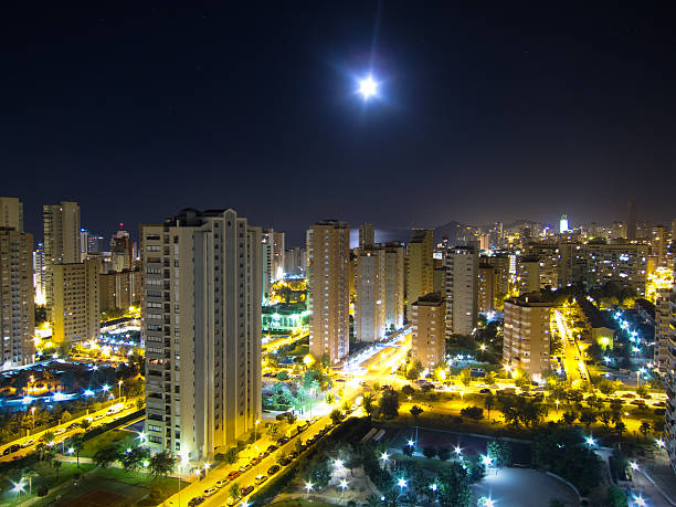 istock Night city skyline and moon 158563164