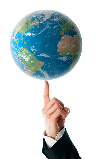 World on a human finger World on a human finger over a white background finger spinning globe stock pictures, royalty-free photos & images