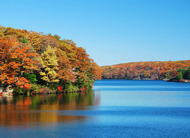 Autumn Mountain with lake Autumn Mountain with lake view and colorful foliage in forest. hudson valley stock pictures, royalty-free photos & images