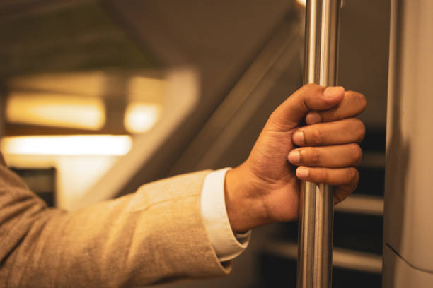 istock Millennial Indian businessman commuting for work. He is taking a train from the station . 1585678382