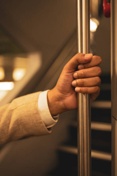 istock Millennial Indian businessman commuting for work. He is taking a train from the station . 1585678383