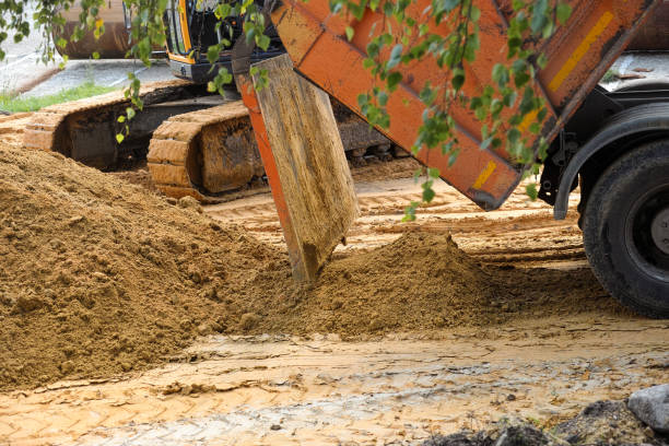 istock A dump truck dumping sand at a construction site. 1585680106