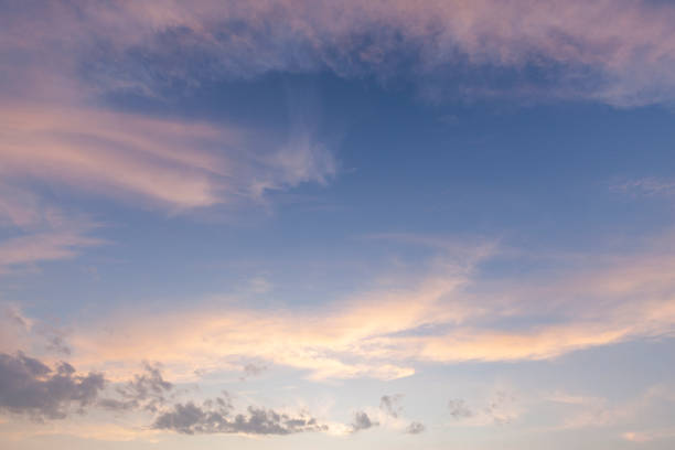 istock Amazing wispy sunset sky with pink clouds 1585721679
