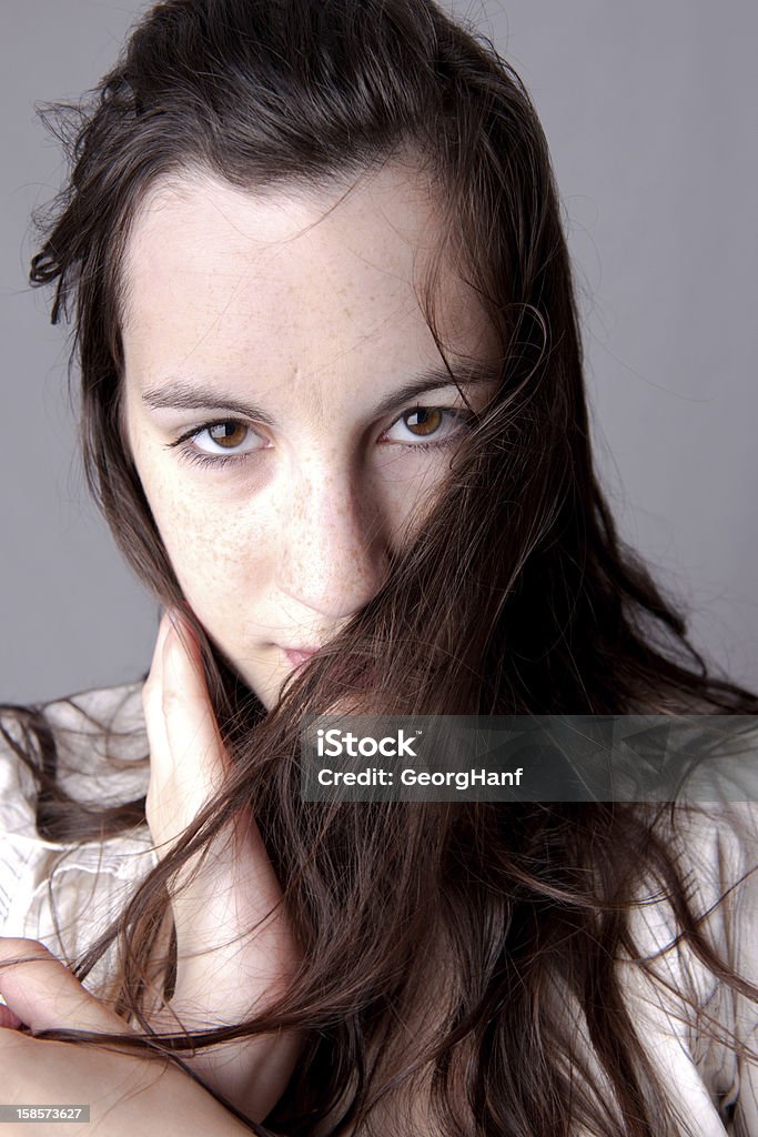 Wind in the Hair Young sensual woman portrait. 20-24 Years Stock Photo