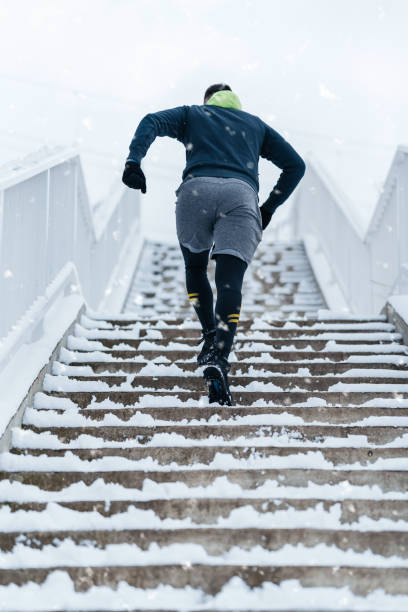 istock Winter running outdoors 1585741439