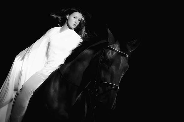 istock Woman and horse 158577654