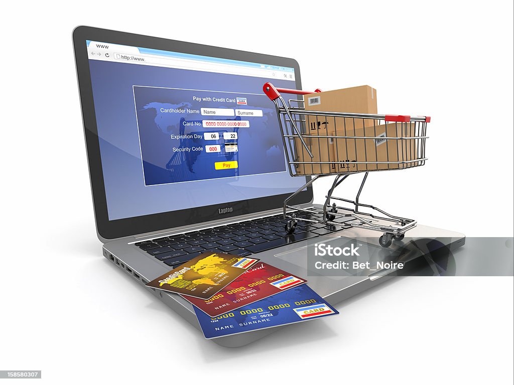 E-commerce. Shopping cart and credit cards on laptop E-commerce. Shopping cart and credit cards on laptop. 3d Business Stock Photo