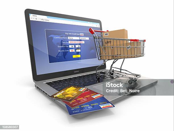 Ecommerce Shopping Cart And Credit Cards On Laptop Stock Photo - Download Image Now