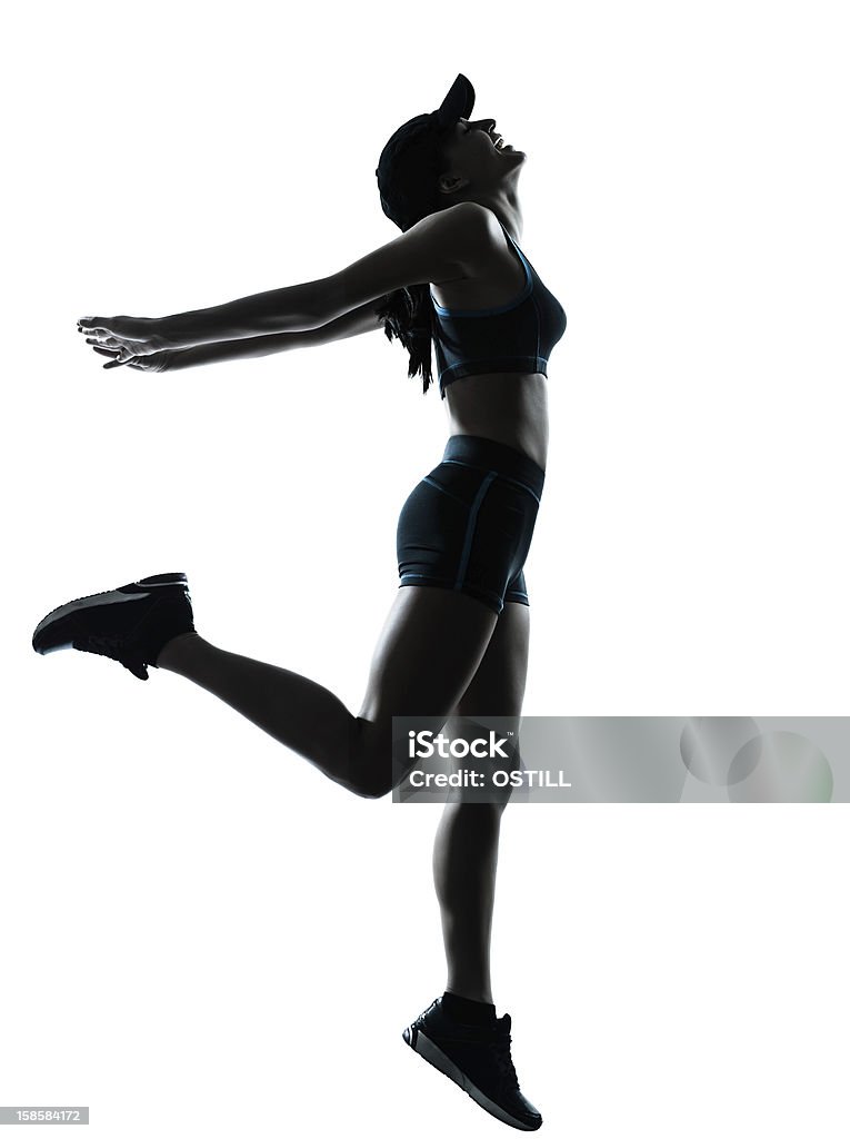 Donna corridore jogger - Foto stock royalty-free di Abbigliamento sportivo