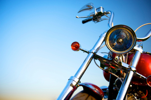 Classic Motorcycle with Blue Sky in Background.