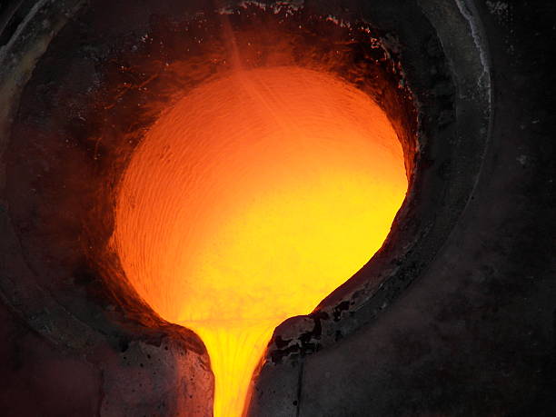 Liquid gold Molten gold being poured at a Nevada gold mine Furnace stock pictures, royalty-free photos & images