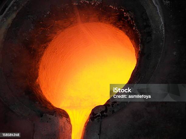 Liquid Gold Stock Photo - Download Image Now - Bronze - Alloy, Manufacturing, Molten